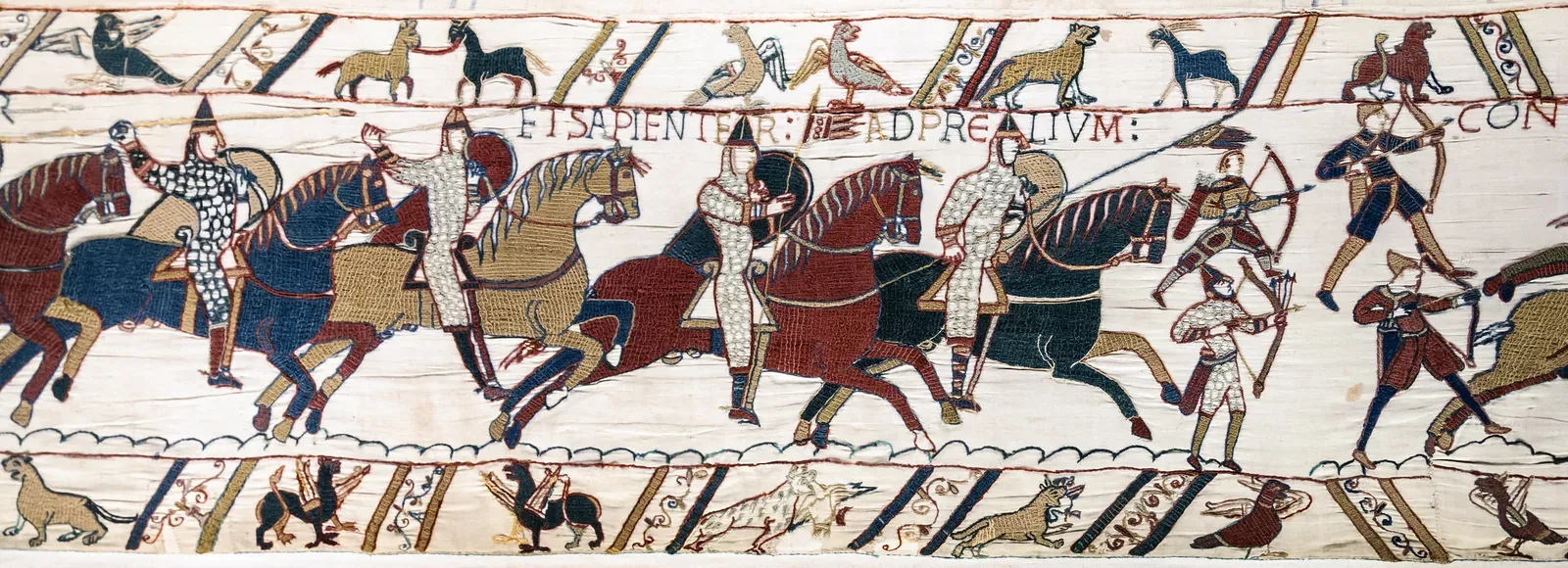 Medieval embroidery depicting Norman knights and archers in battle, the Bayeux Tapestry